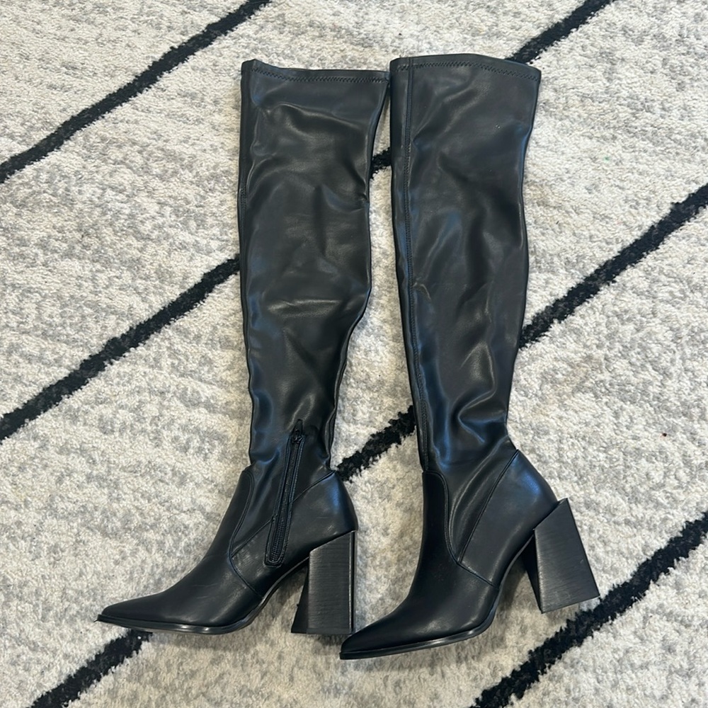Size 7 women’s black over the knee leather boot